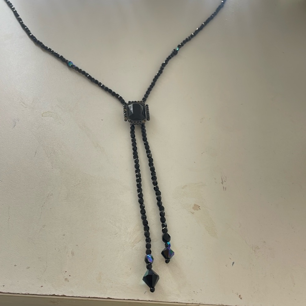 Long black beaded necklace